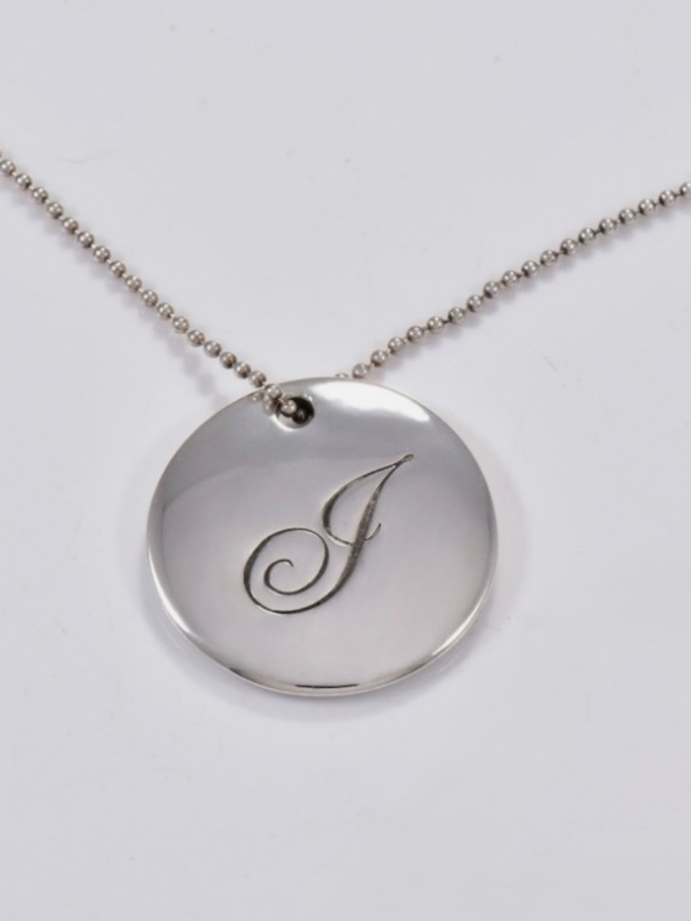 Tiffany & co. 925 sterling silver Large Circle Notes J Pendant Necklace